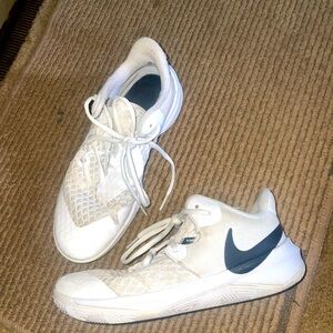 Volleyball shoes size 7.5 in women’s used but still has a lot of  life in them